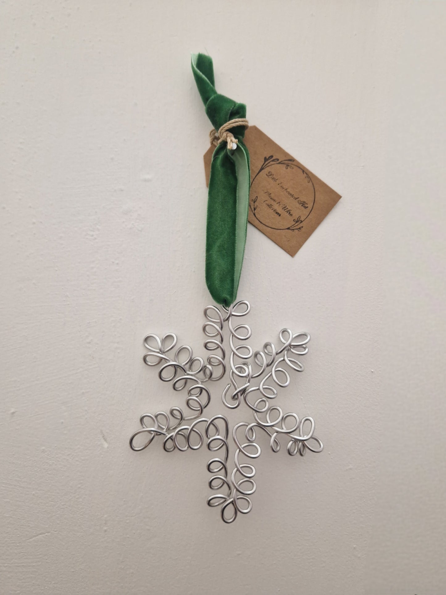 Handcrafted wire sculptured Christmas decorations.