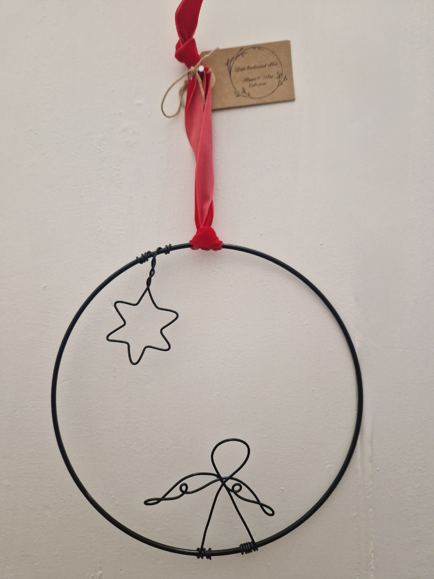 Handcrafted wire Christmas decor hoop.